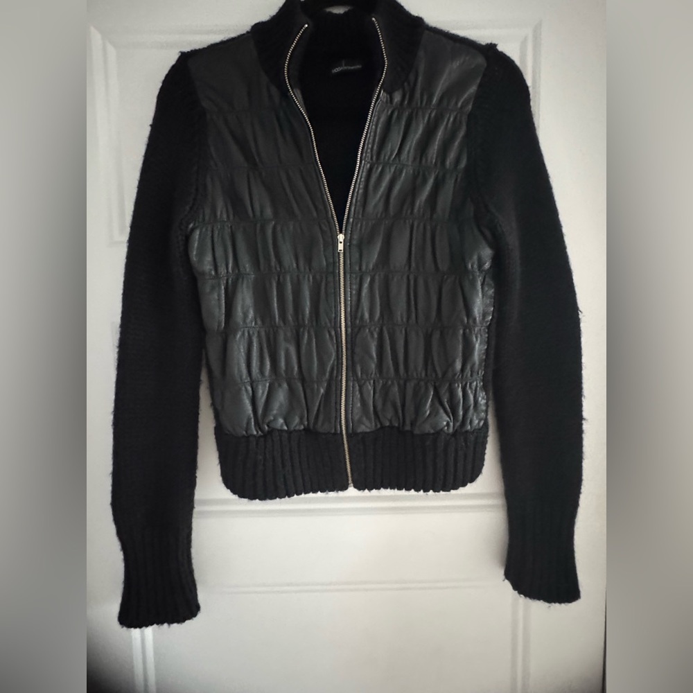 Moda International Black Knitwear,
The front is made of soft leather like new.